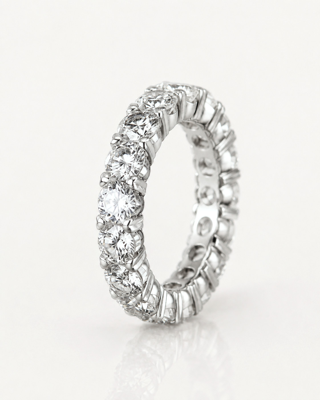 A diamond eternity wedding band standing on edge