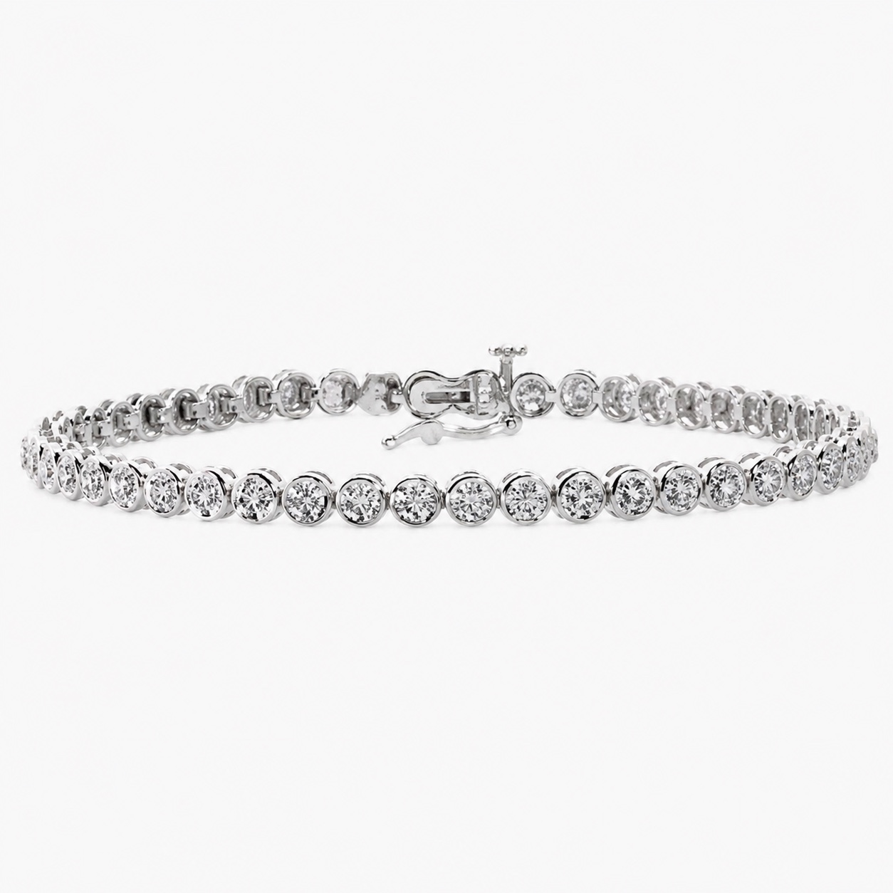 An 18ct white gold tennis bracelet of rub-over set round brilliant diamonds