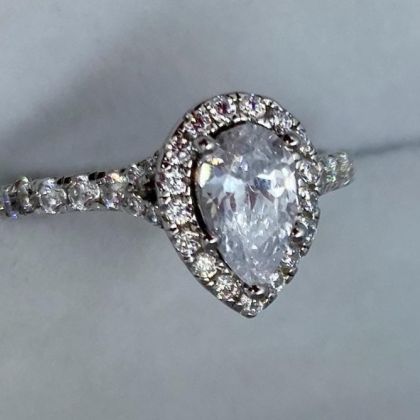 PEAR CUT DIAMOND WITH DIAMOND HALO ENGAGEMENT RING